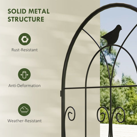 Black wrought iron garden arch with ornate scrollwork and bird silhouette offers lots for climbing plants and two trellises
