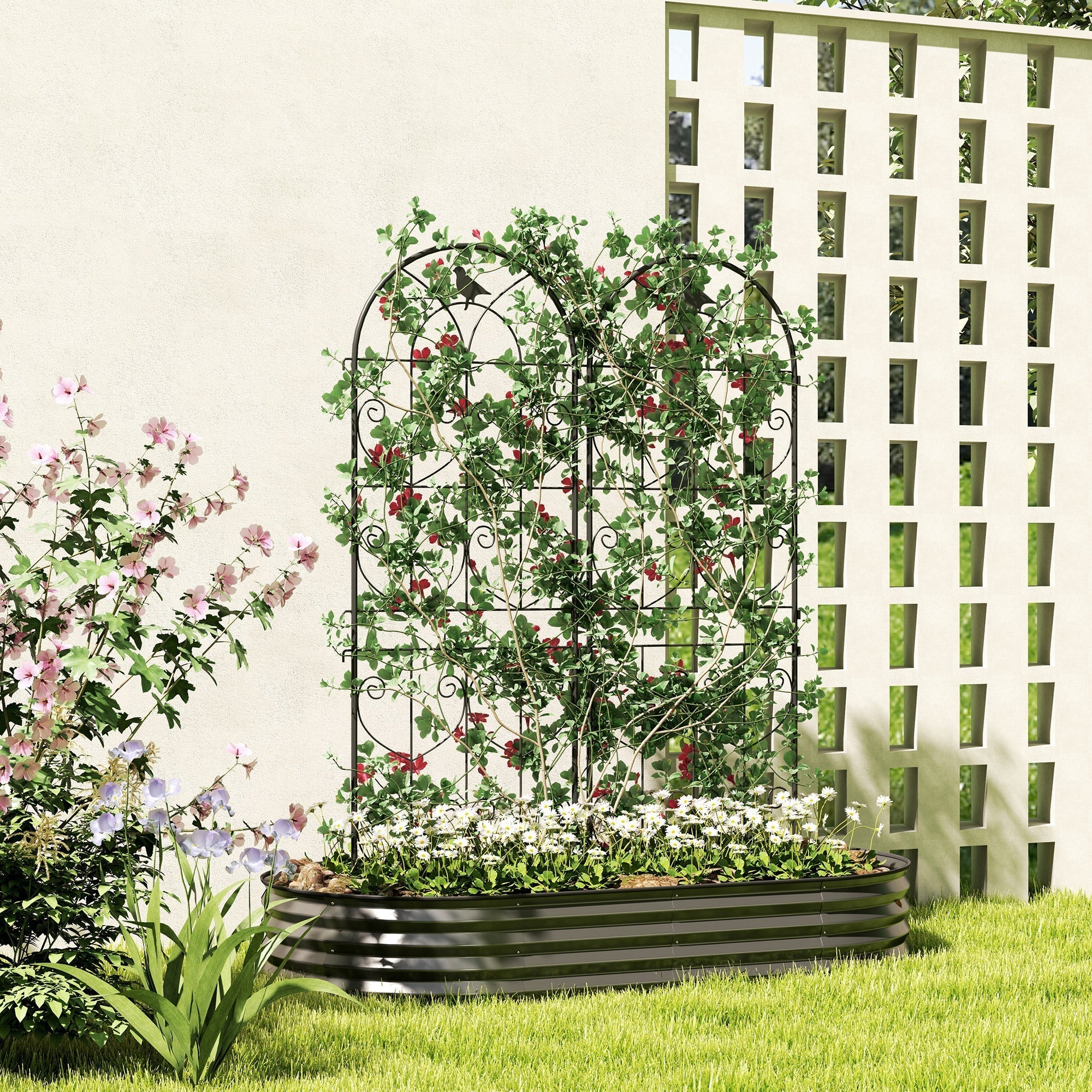 Black wrought iron two trellises with ornate scrollwork offer lots of support for climbing plants and flowers in garden bed