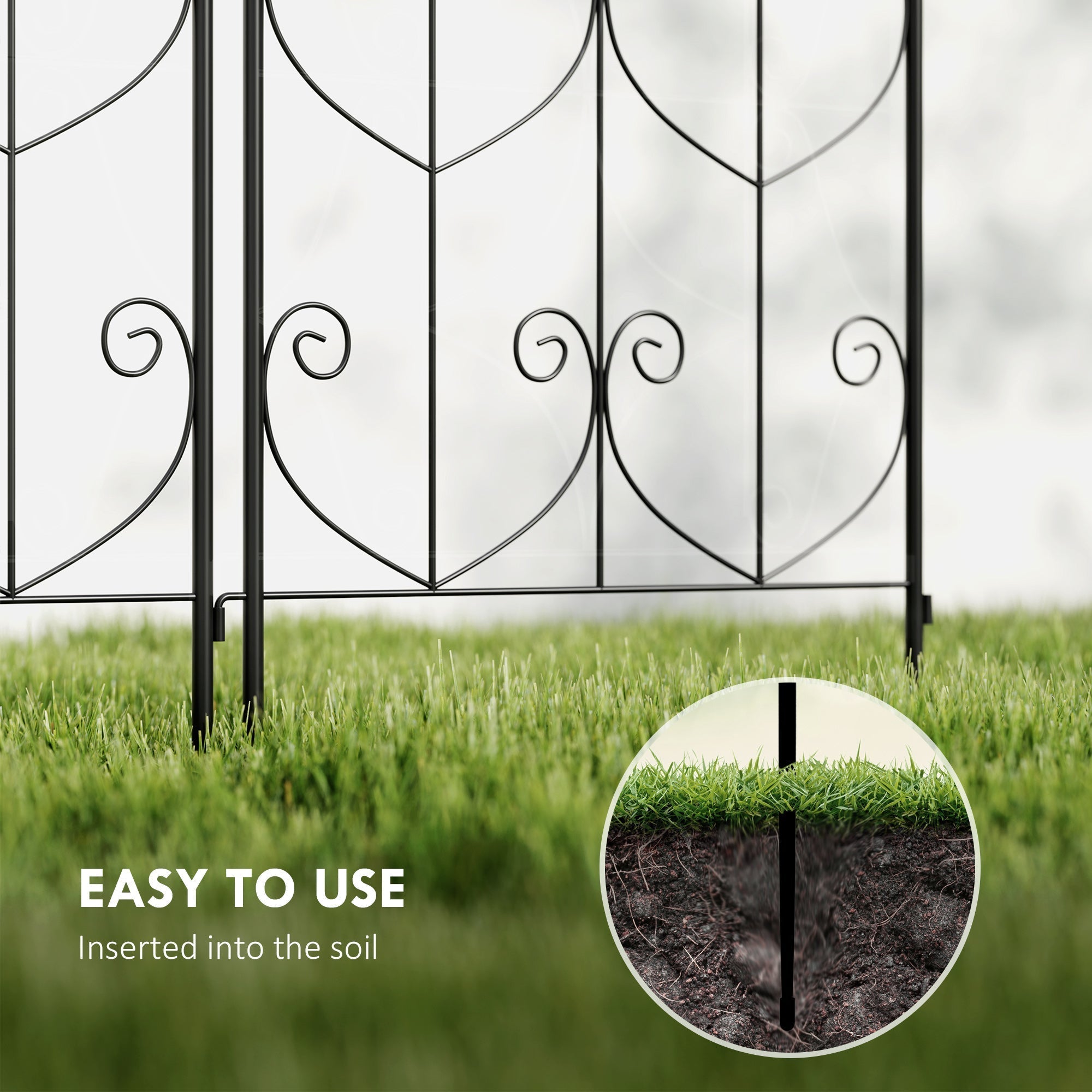 Black wrought iron two trellises with heart shaped scrollwork offer lots of support for climbing plants outdoors