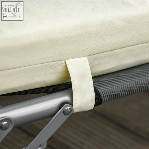 Beige canvas replacement cushion with black strap for rattan furniture made of cream white polyester fabric