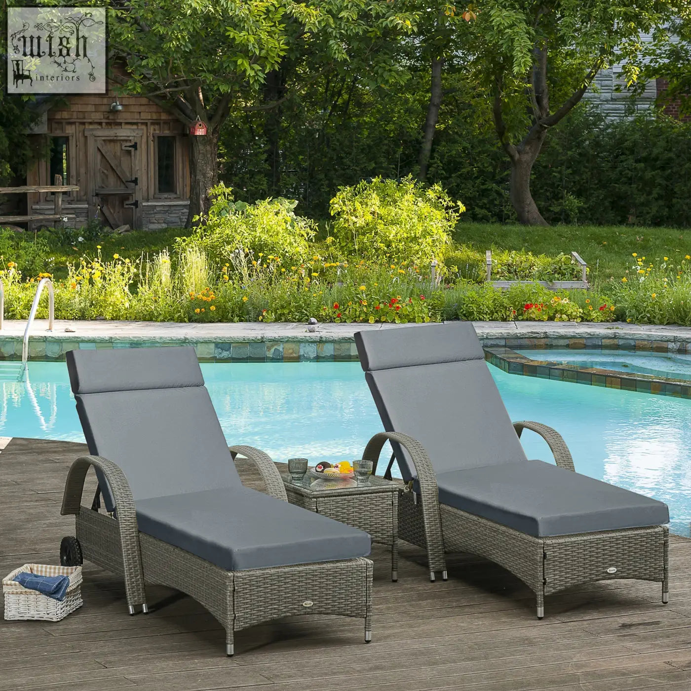 Gray wicker lounge chairs with dark grey polyester fabric replacement cushions and a small side table nearby