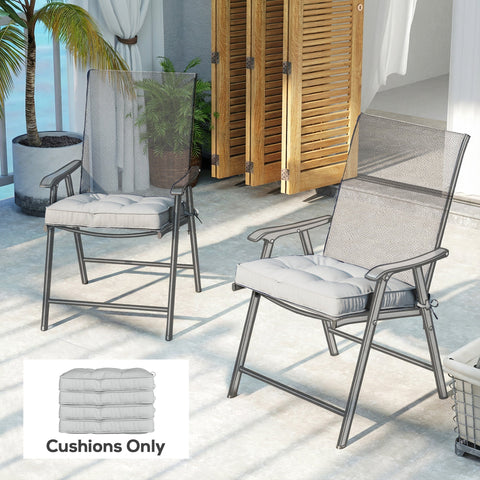Gray mesh patio chairs with light grey outsunny seat cushions featuring two tie fastenings for outdoor seating and light stains