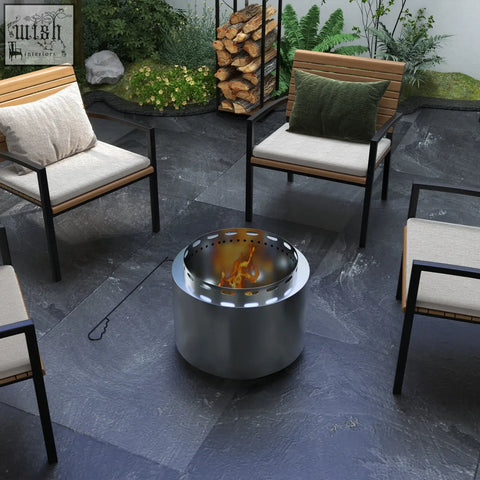 Silver stainless steel smokeless fire pit with perforated top and visible flames for garden camping bonfire party