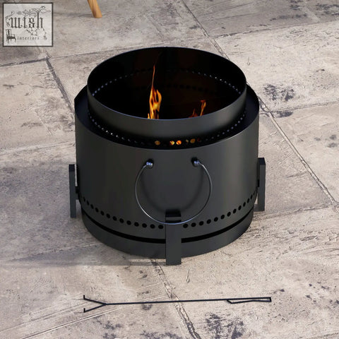 Black metal smokeless fire pit with perforated sides and circular handle designed for high heat resistance and secondary combustion