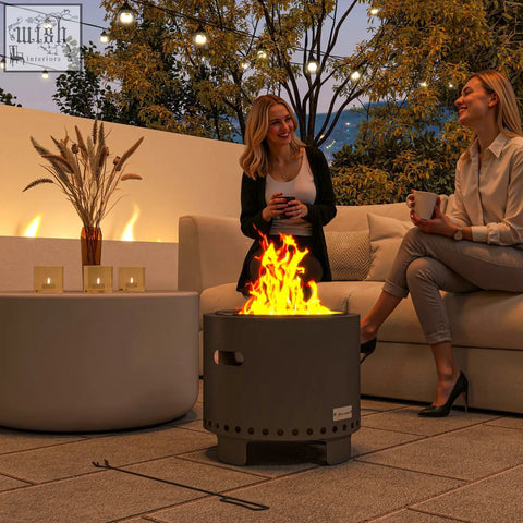 Outsunny smokeless steel fire pit in dark grey powder-coated steel with secondary combustion and circular vents