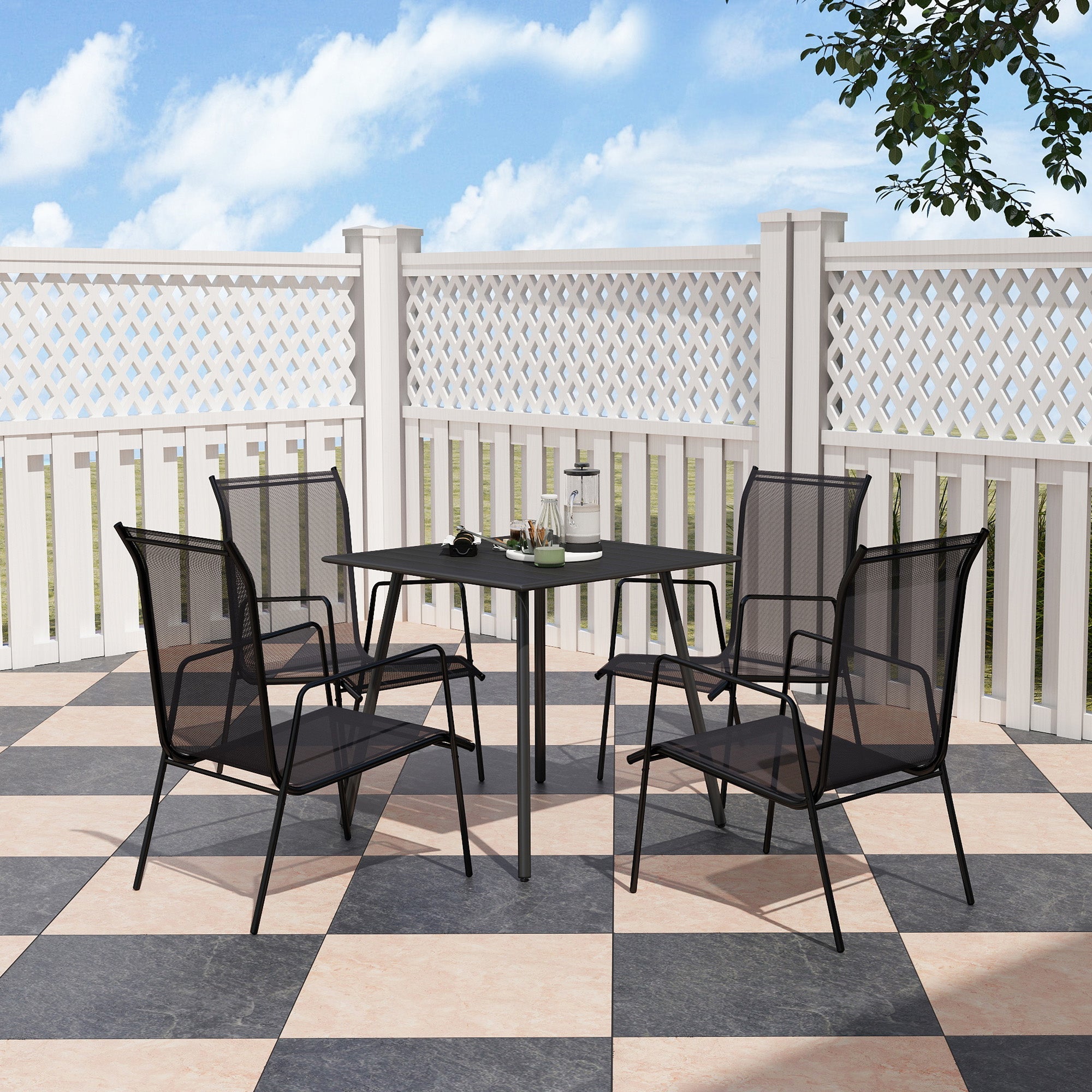 Black metal mesh garden table with four chairs featuring a powder-coated steel frame for outdoor dining