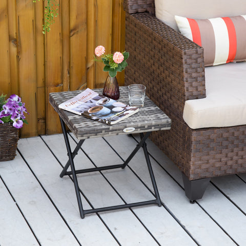 Gray woven resin folding table with black steel frame perfect for outdoor use and easy storage