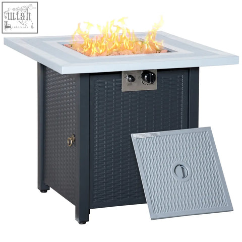 Outsunny black wicker propane pit table with white square top, silver knobs, lava rocks, and active flame outdoor heater