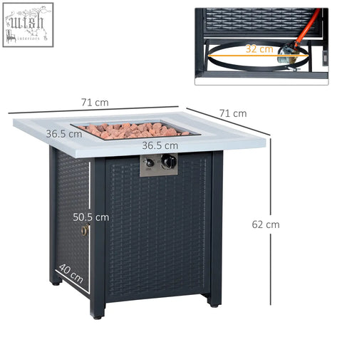 Black wicker propane pit table with light gray stone top lava rocks and two control knobs for outdoor use