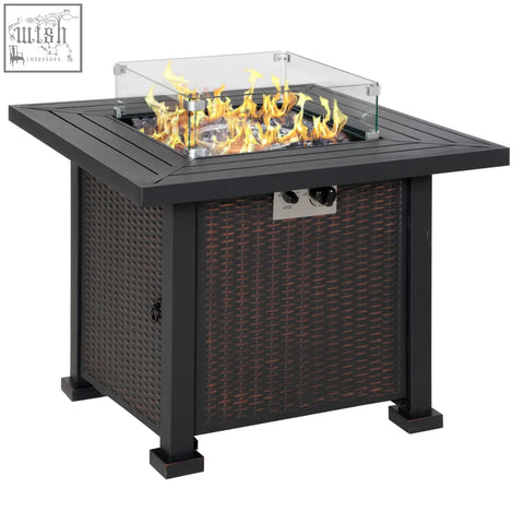 Black wicker outdoorsy pit table with burning flames glass screen glass beads rattan smokeless firepit heater