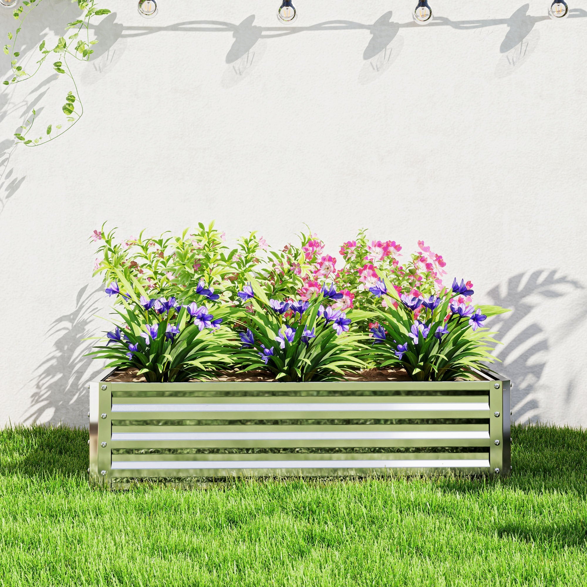 Rectangular green metal garden bed with galvanised steel frame and silver accents for direct contact growing