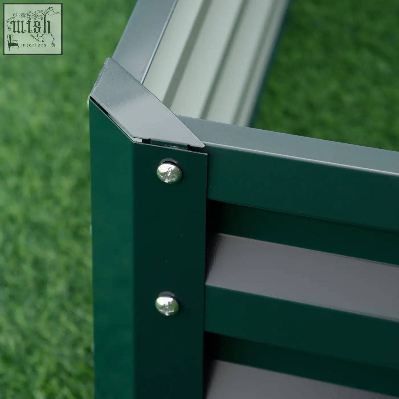 Dark green metal frame of outsunny garden bed box with galvanised steel and silver screws for direct contact joints