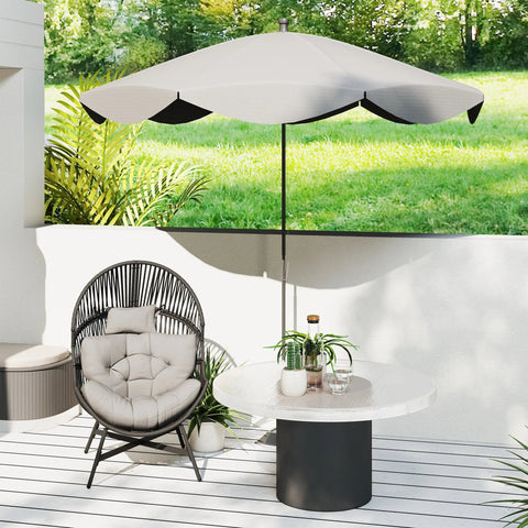 Beige patio umbrella with black trim and sturdy pole next to outsunny standing rattan egg chair with powder-coated steel frame