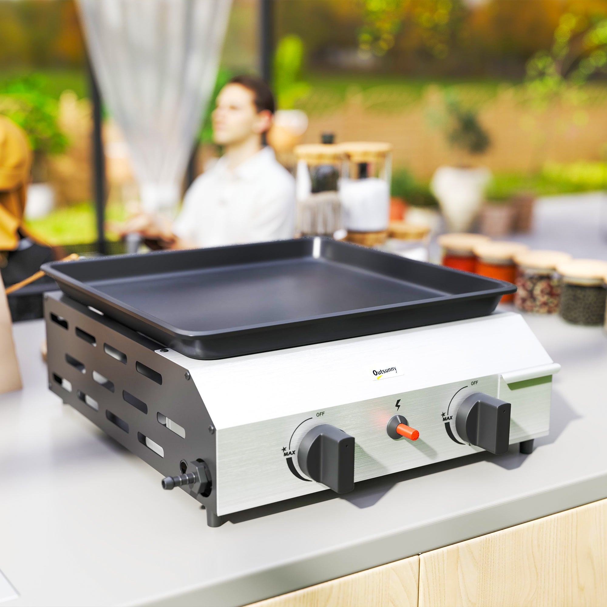 Outsunny two burner portable gas grill with white and black non-stick griddle surface and grease collection box