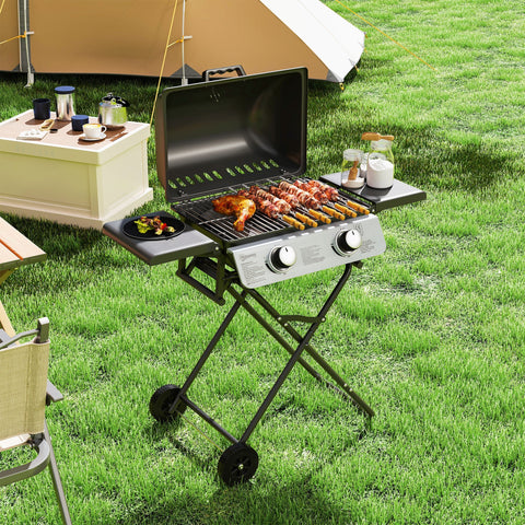 Outsunny two-burner portable suitcase gas grill in black with stainless steel grill grate foldable legs and wheels