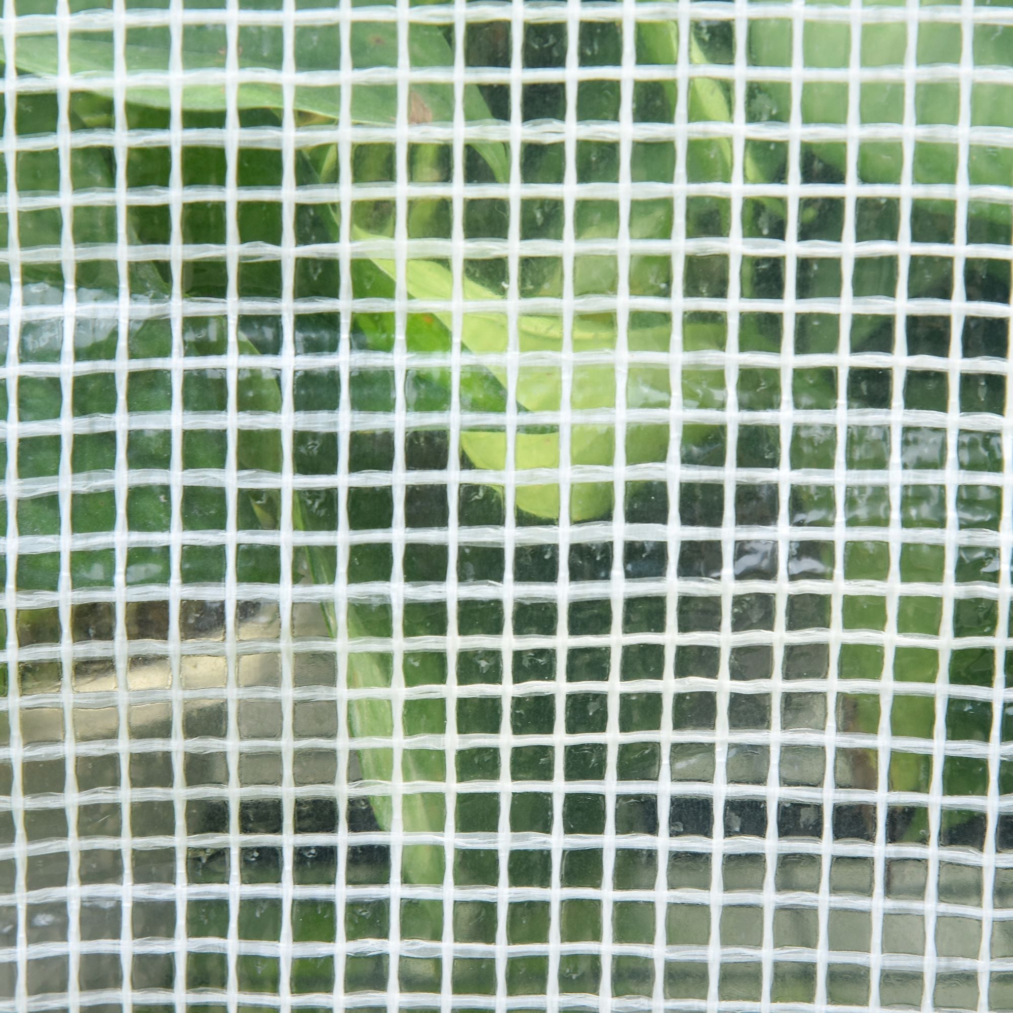 White mesh screen with fine grid on the roll-up door of outsunny portable green greenhouse with reinforced pe cover
