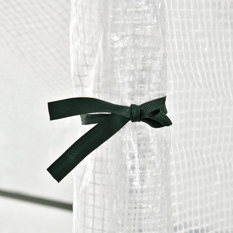 Dark green satin ribbon tied in a bow on a transparent plastic tube of outsunny greenhouse with steel frame for extra stability
