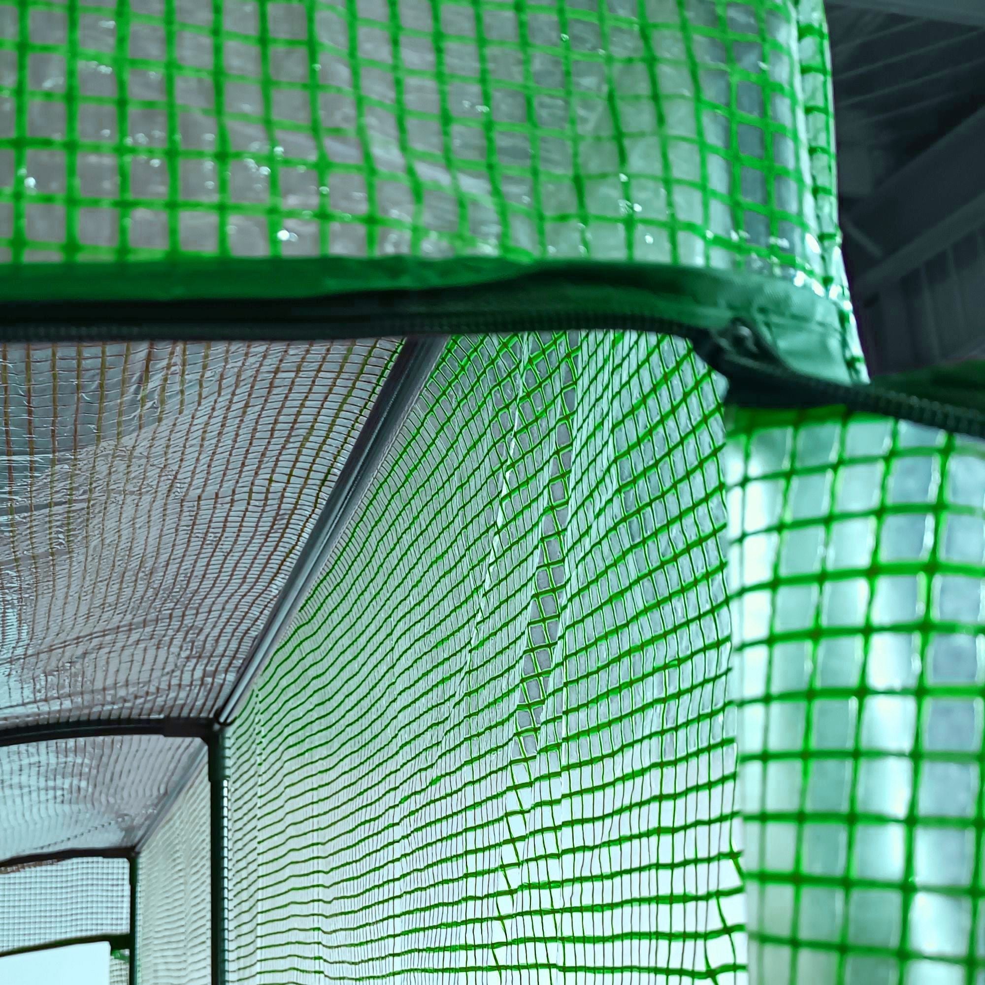 Outsunny walk-in lean to wall greenhouse with green mesh netting and black trim for plant nursery use outdoors