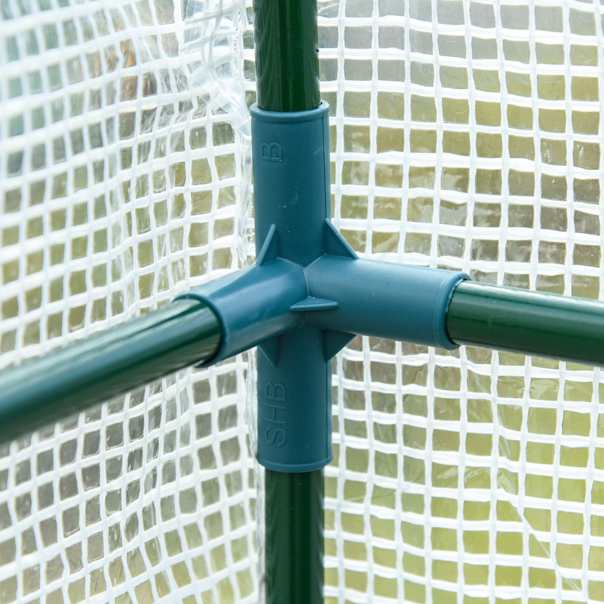 Teal plastic connector joining green metal poles on outsunny walk-in lean to wall greenhouse 200l x 100w x 215hcm