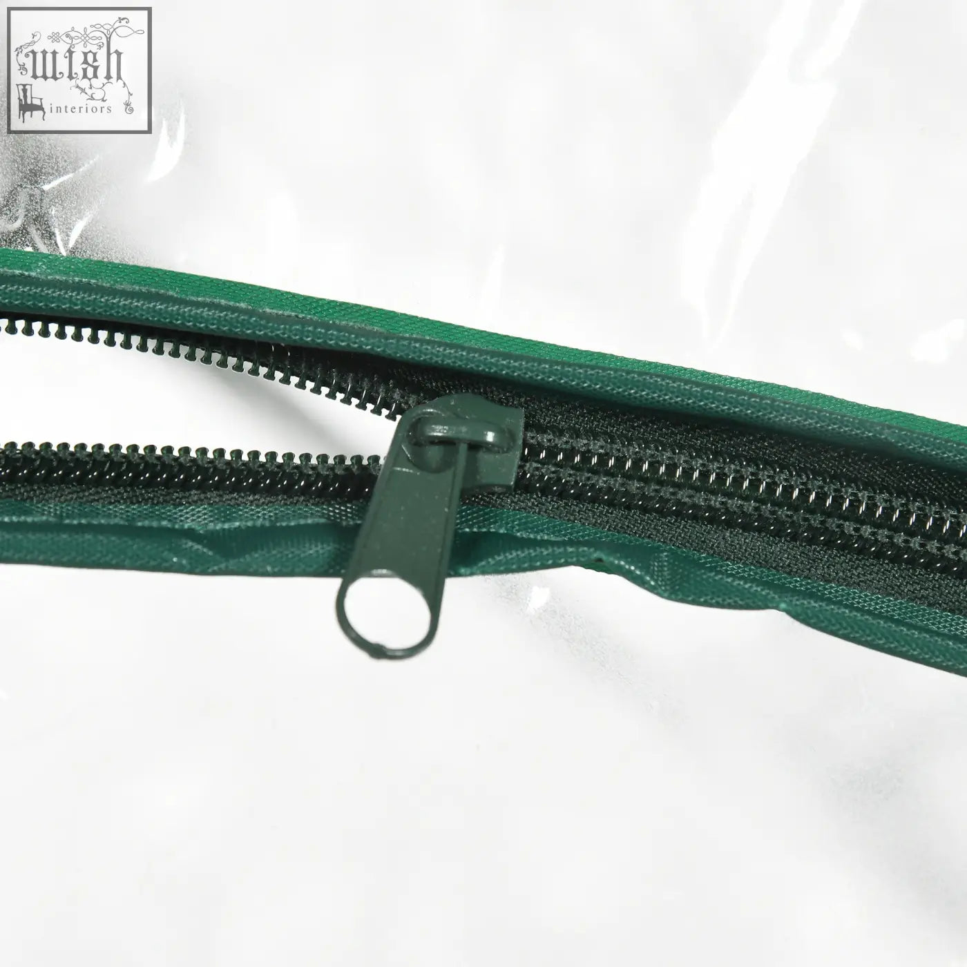 Green zipper with dark green pull tab on quilted edge of outsunny pvc greenhouse plastic cover with steel frame for extra stability