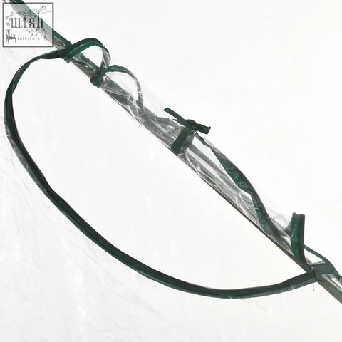 Clear plastic cover with green zipper and reinforced handles on outsunny steel frame greenhouse for extra stability