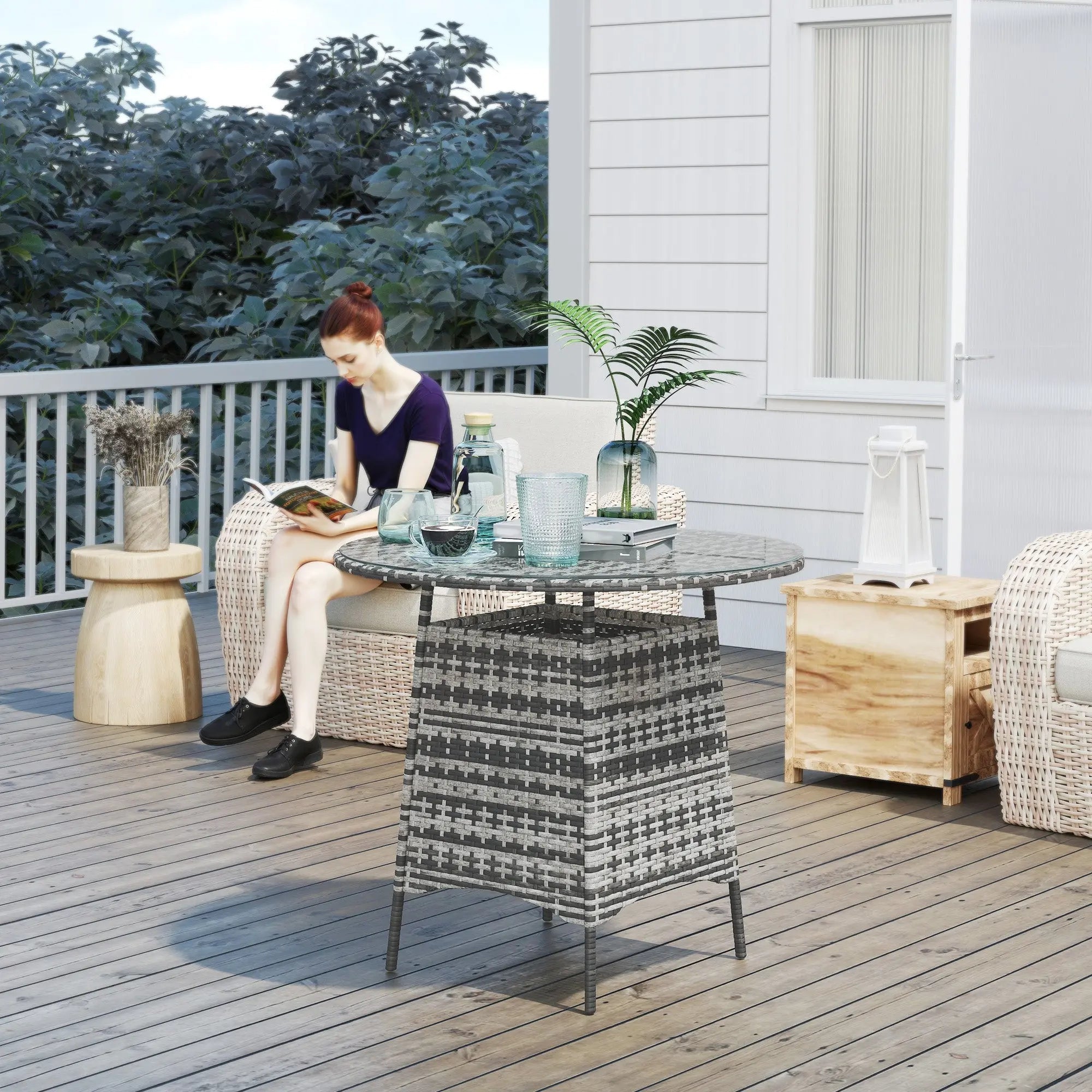 Gray and black woven outdoor coffee table with tempered glass top and umbrella hole for patio use by Outsunny