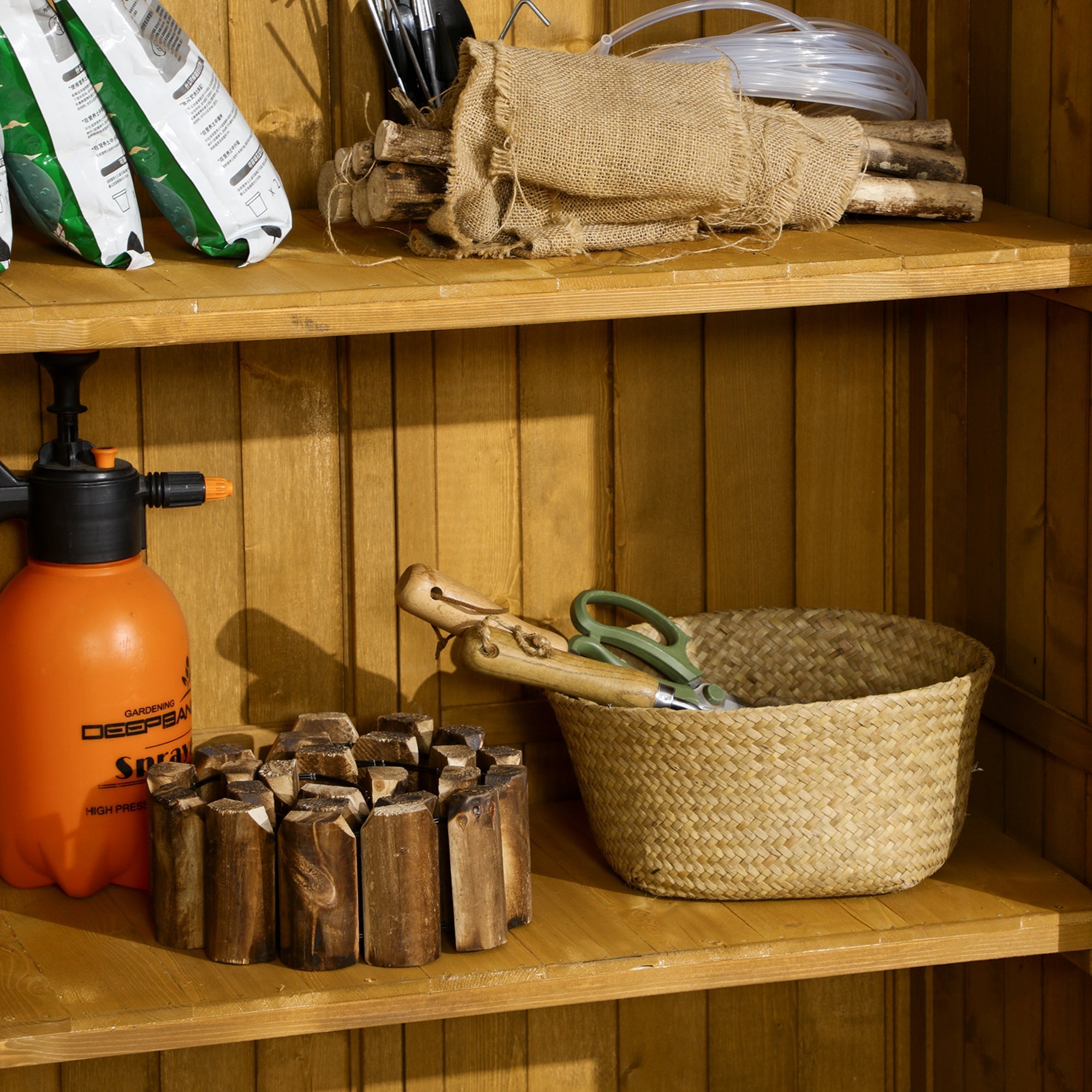 Orange plastic garden sprayer with black nozzle and trigger inside outsunny fir wood garden storage shed organizer unit