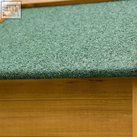 Green textured carpeted step with wooden frame in natural wood effect fir wood garden storage shed utility cabinet