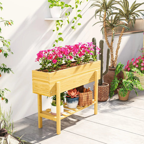 Outsunny fir wood garden bed with drainage holes in natural finish filled with pink petunias and lower storage shelf