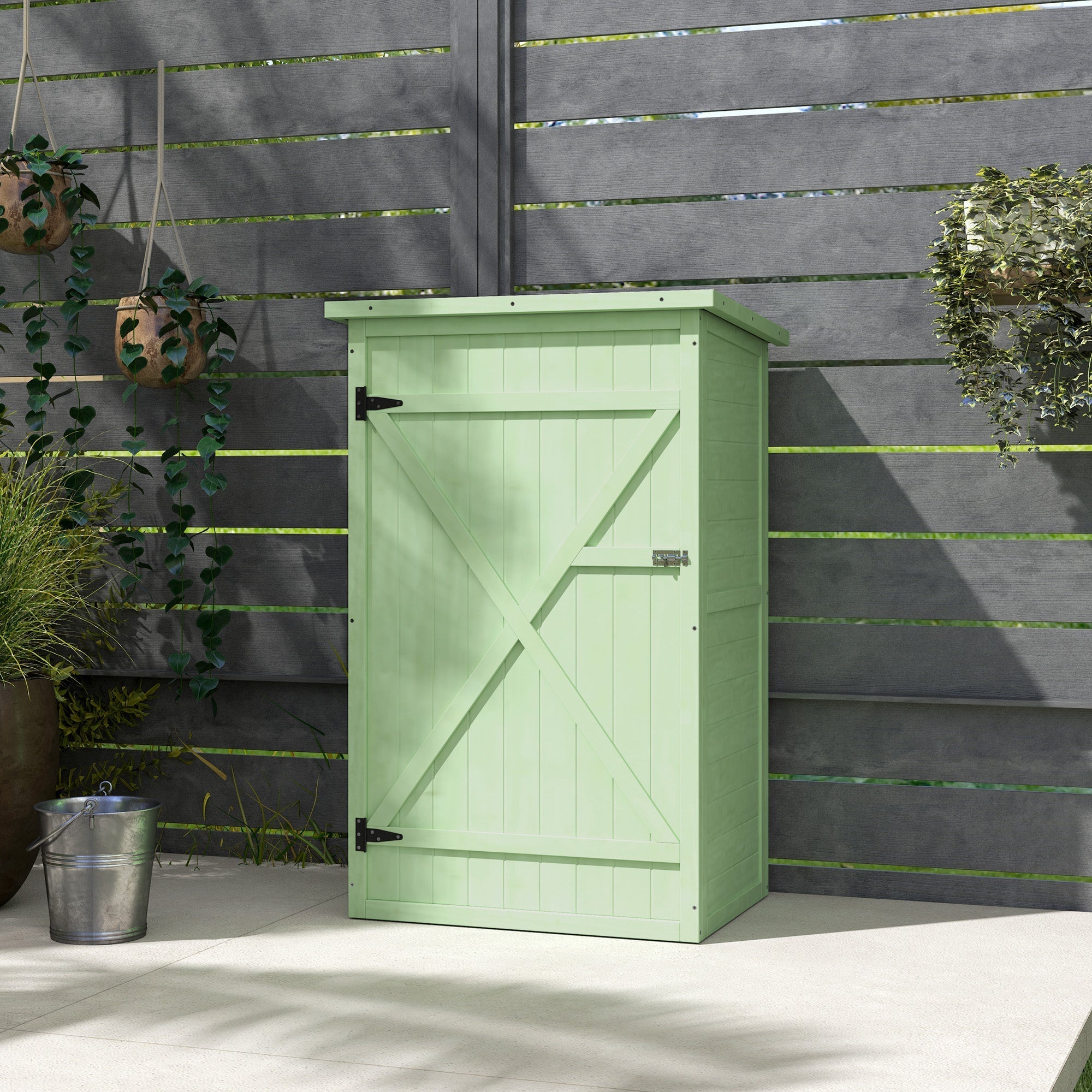 Light green wooden garden storage shed with cross braced door black hinges perfect for garden tool storage 75l x 56w