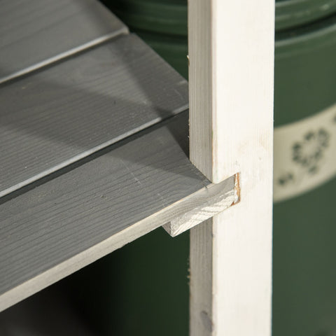 Gray wooden shed with white support beam for garden tool storage 75l x 56w with shelves and bolt latch