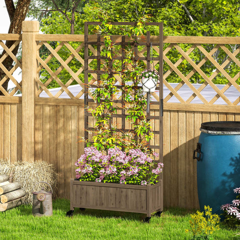 Brown wooden outsunny raised garden bed planter with lattice trellis and wheels filled with purple flowers