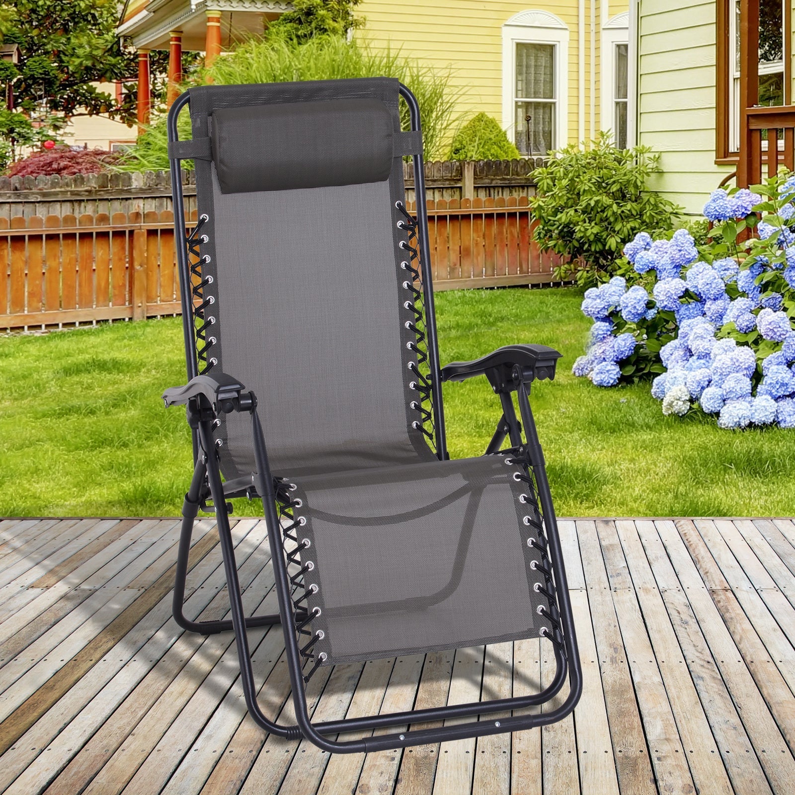 Black fabric gravity chair with metal frame and padded headrest perfect for outdoor relaxing and camping