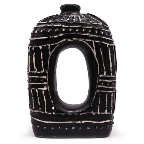 Black ceramic oval donut shaped vase with white geometric patterns and central oval opening for dry flowers