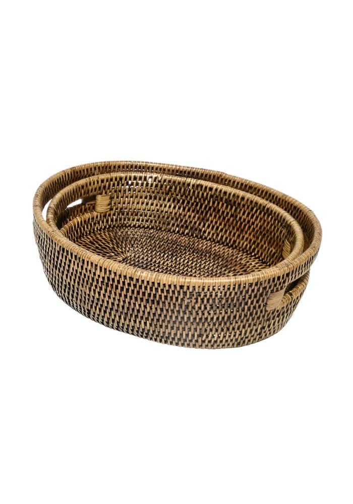 Set of three oval rattan baskets with woven texture and natural brown tones perfect for home decor and storage