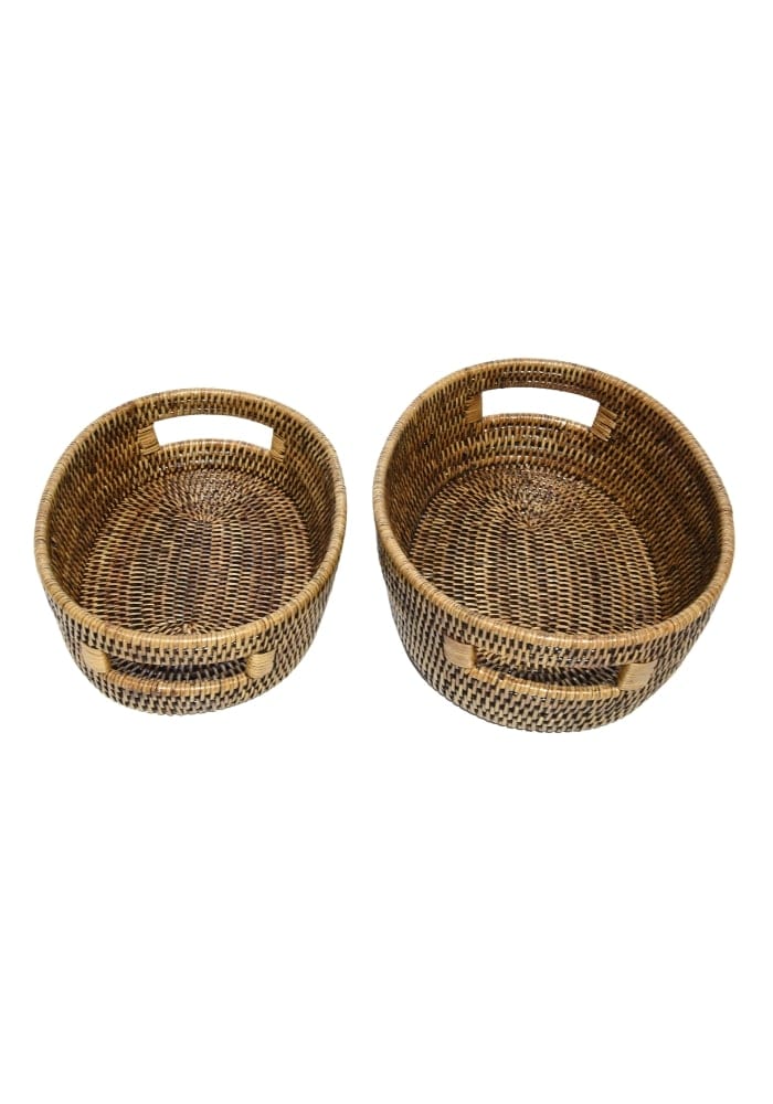 Two oval rattan baskets in brown with woven wicker design and reinforced handles for sturdy storage