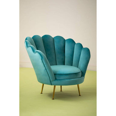 A turquoise velvet ovala blue scalloped chair with shell shape and gold-tone legs for stylish seating