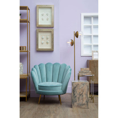 A turquoise ovala blue scalloped chair with shell-shaped back and gold metal legs perfect for stylish seating