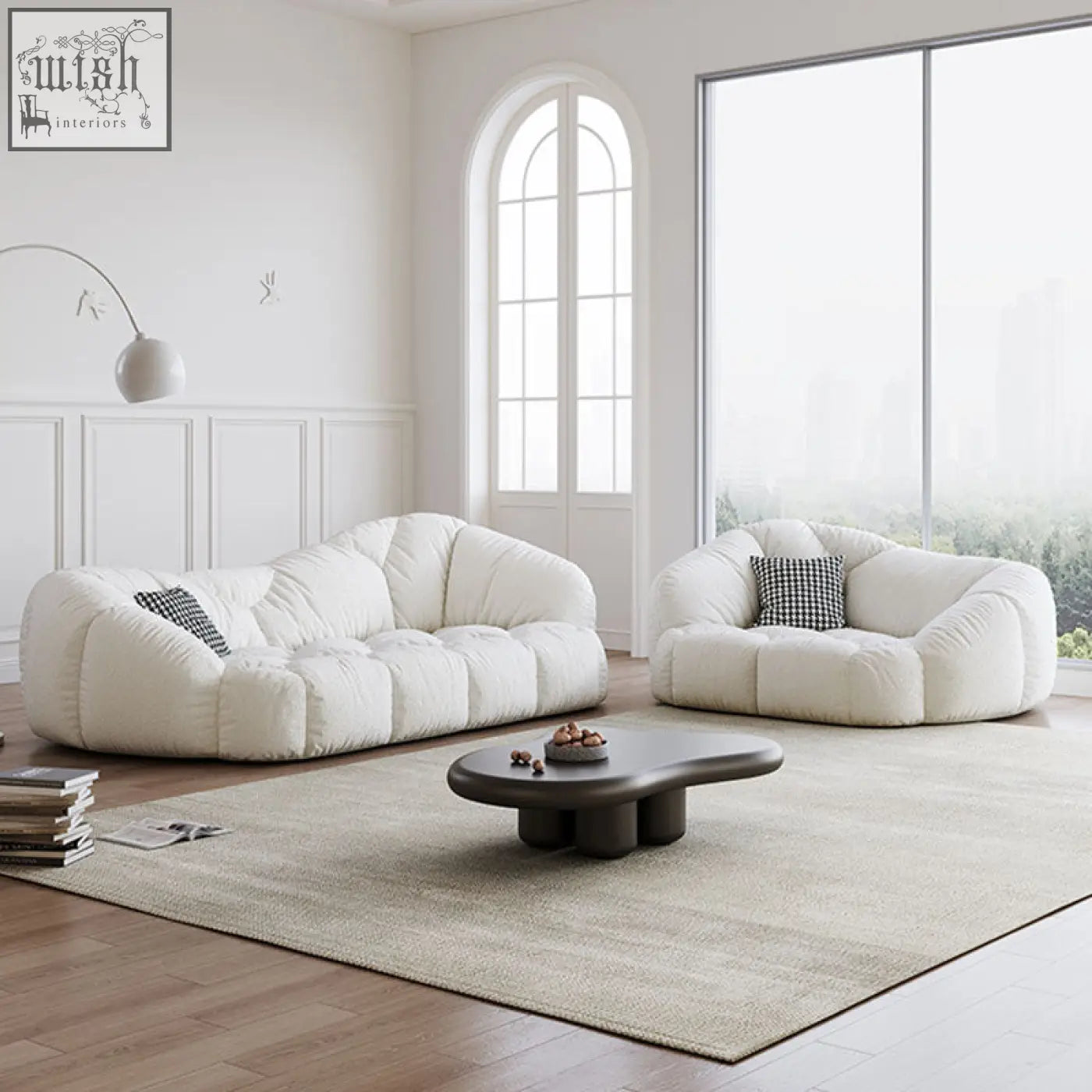 Cream-colored plush owen marshmallow two seater sofa in off white real leather with soft segmented cushions