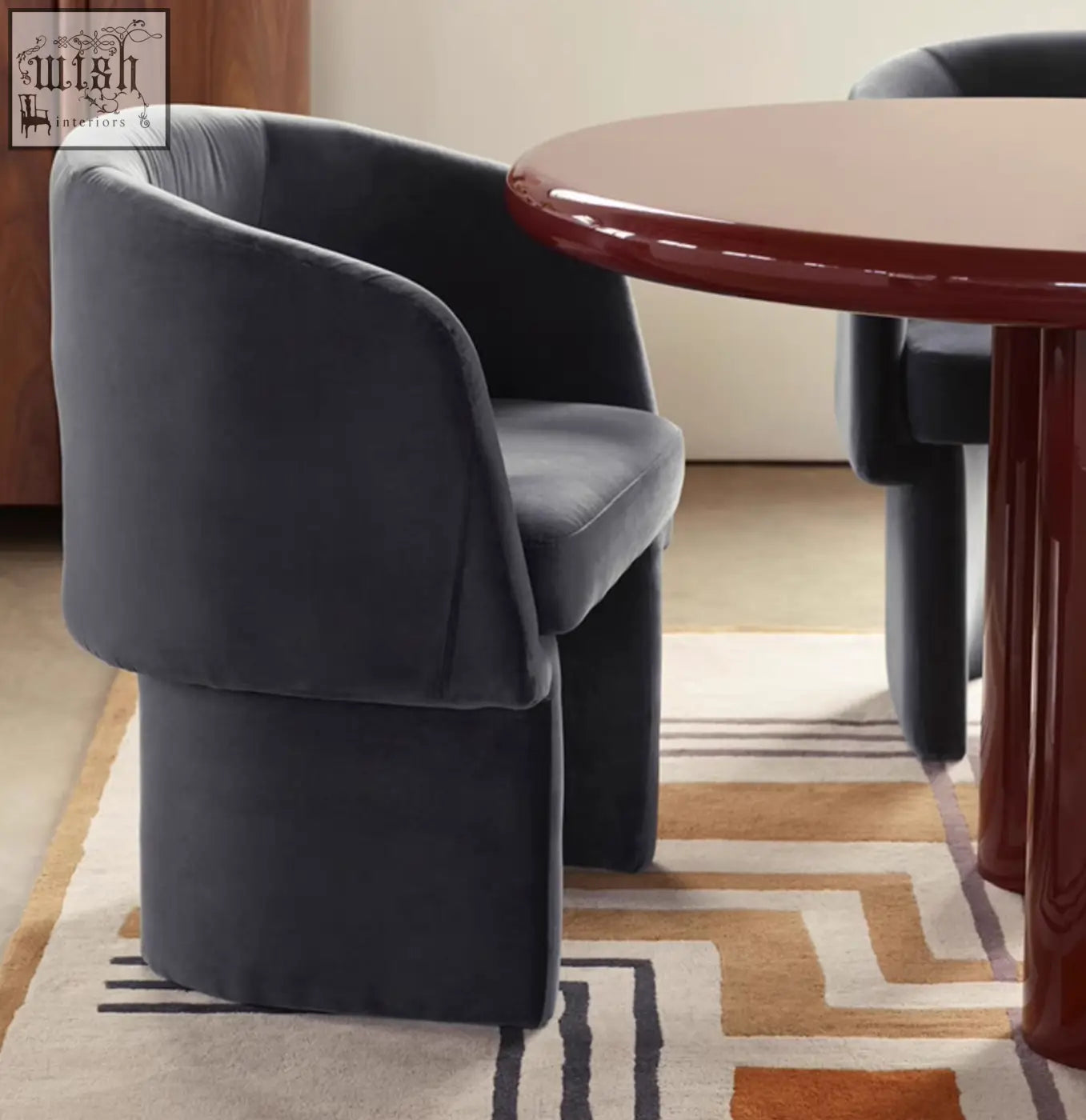 Dark gray velvet paddy dining chair with rounded back perfect for marble dining and marble dining table settings