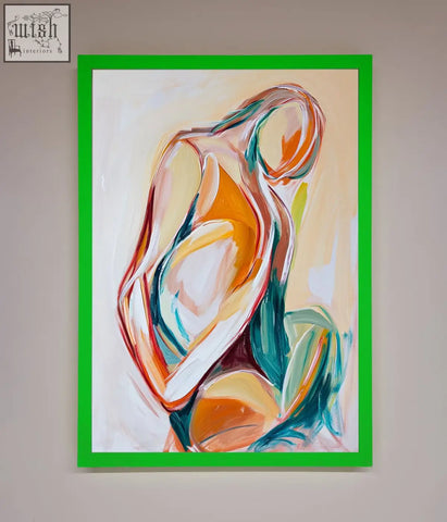 Abstract painting of a human form with orange teal and cream brushstrokes in a vibrant green pain stroke embrace framed poster