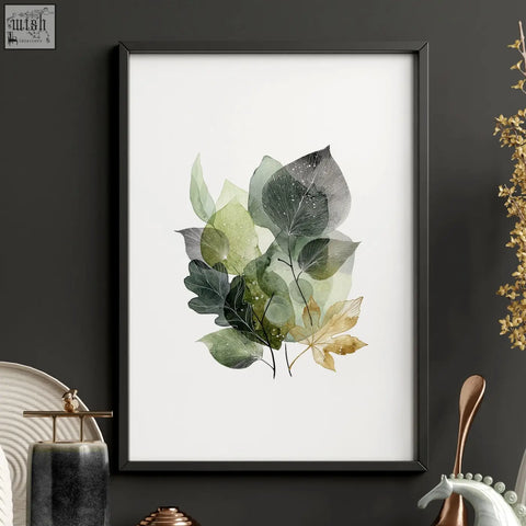 A framed watercolor wall art print with green and gold botanical leaves perfect for home office decor