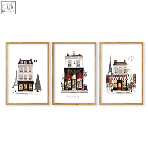 Set of three framed parisian street scenes wall art in light wood frames for kitchen with pour toujours theme