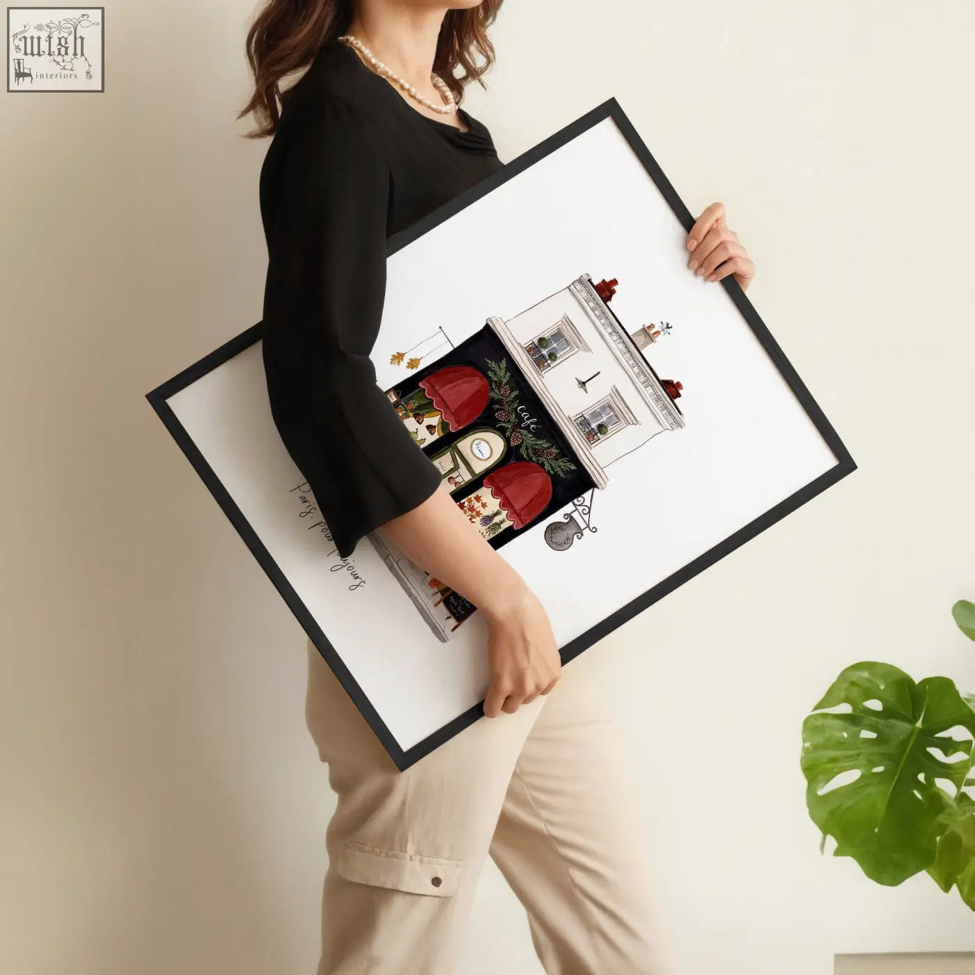 Black-framed wall art featuring charming paris boutique street scenes with red awnings and greenery pour toujours style