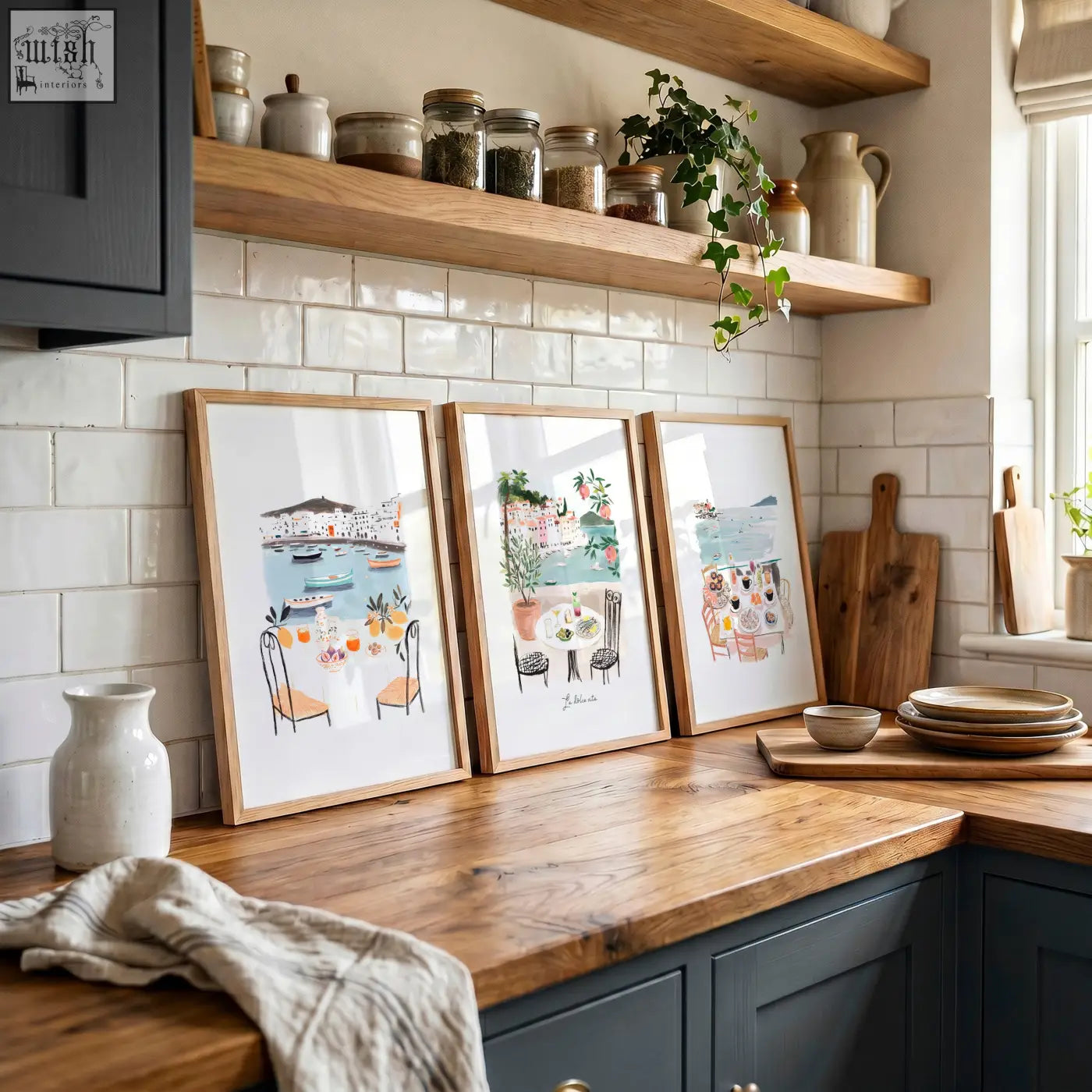 Three light wood framed paintings for kitchen walls showing mediterranean coastal dining scenes dolce vita style