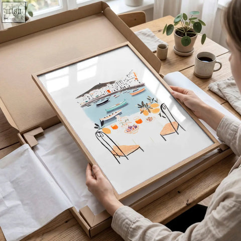 A light wood-framed painting showing colorful mediterranean coastal dining with boats and tables for kitchen walls dolce vita