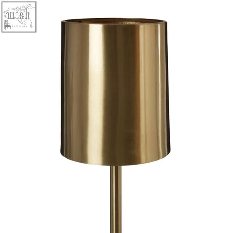 Palais table lamp with brass cylindrical body and white marble base featuring a sleek minimalist design