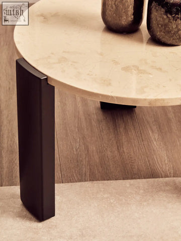 Palermo round cream marble top small coffee table with beige marble top and sleek black metal legs