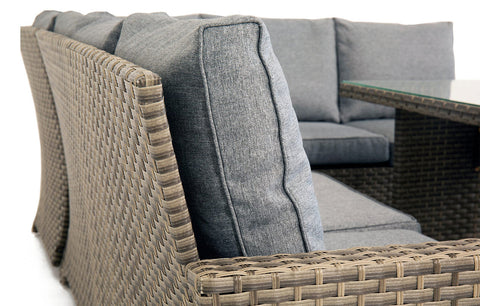 Gray cushioned corner sofa with woven rattan garden frame in palma grey lounge set and cushion box bundle