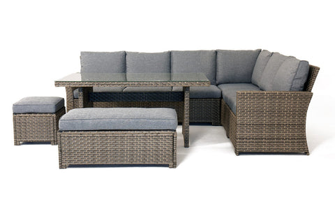 Gray wicker corner sofa lounge set with matching ottomans and glass-top table perfect for rattan garden use
